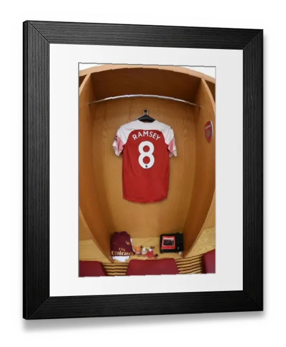 Framed Print : Arsenal FC: Aaron Ramsey's Empty Jersey in the Changing Room Before Arsenal v Southampton (2018-19)