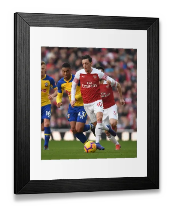 Framed Print : Arsenal's Xhaka Outmaneuvers Southampton's Valery in Premier League Clash Framed Print : Arsenal's Xhaka Outmaneuvers Southampton's Valery in Premier League Clash