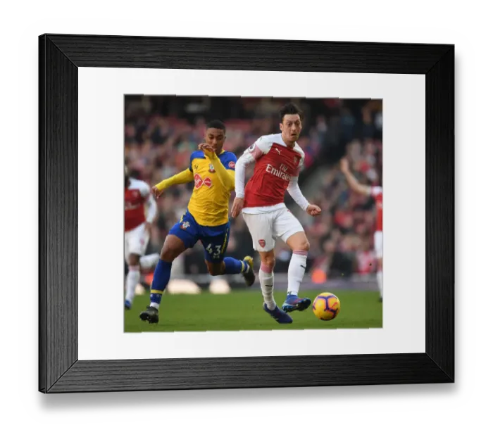 Framed Print : Arsenal's Granit Xhaka Outmaneuvers Southampton's Yan Valery in Premier League Clash Framed Print : Arsenal's Granit Xhaka Outmaneuvers Southampton's Yan Valery in Premier League Clash