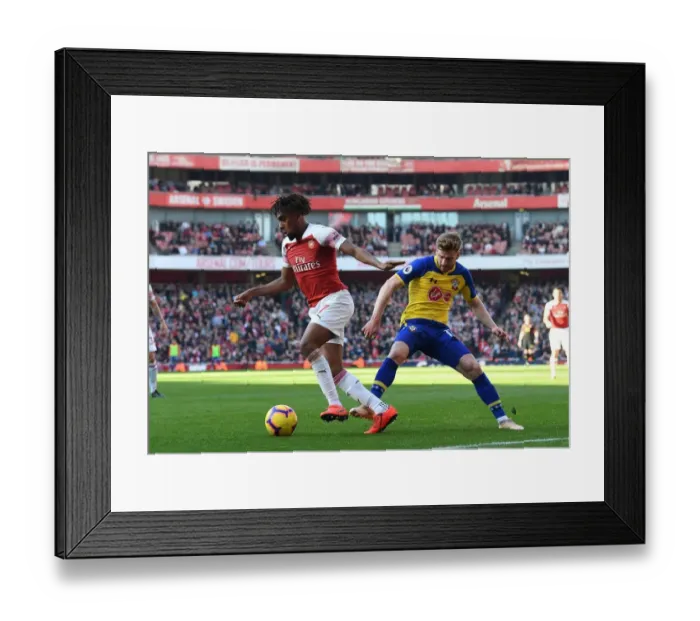 Framed Print : Arsenal vs Southampton: Clash between Iwobi and Armstrong in the Premier League