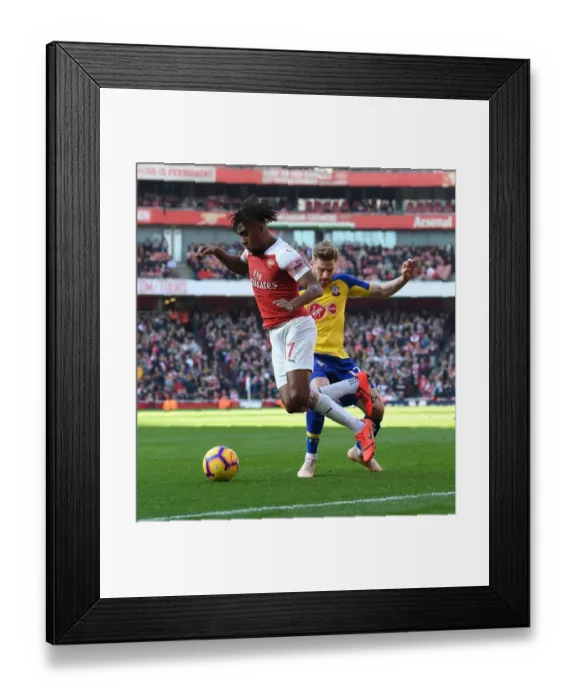 Framed Print : Arsenal vs Southampton: Iwobi vs Armstrong - Premier League Clash at Emirates Stadium