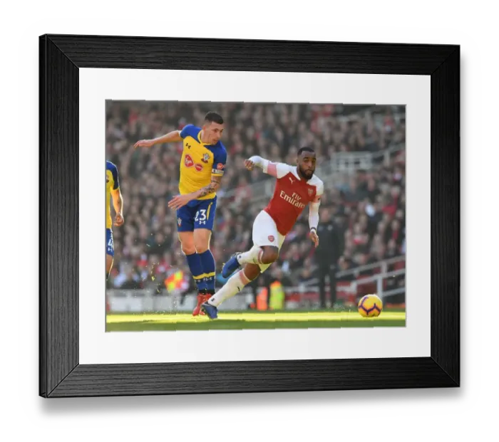 Framed Print : Clash at Emirates: A Battle Between Lacazette and Hojbjerg - Arsenal vs. Southampton, Premier League