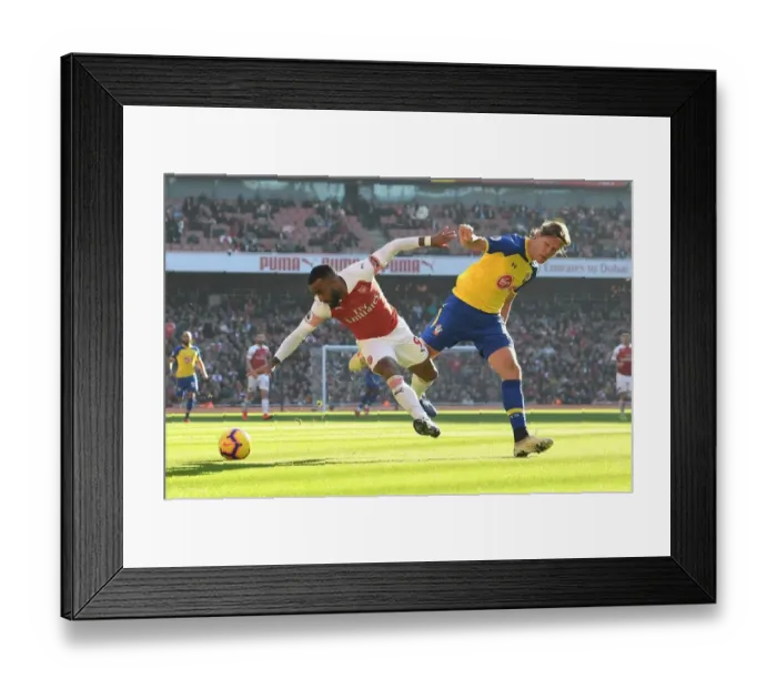 Framed Print : Clash at Emirates: Lacazette vs. Vestergaard - Arsenal vs. Southampton, Premier League