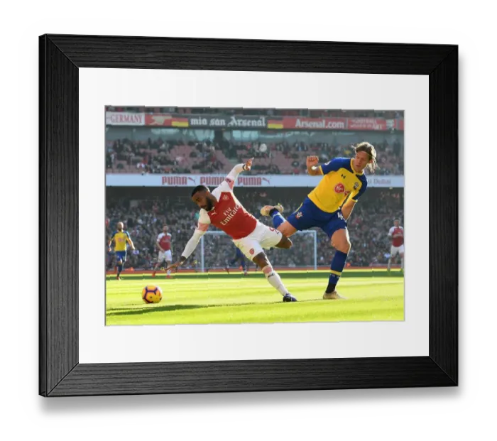 Framed Print : Intense Battle: Lacazette vs. Vestergaard in Arsenal vs. Southampton Showdown Framed Print : Intense Battle: Lacazette vs. Vestergaard in Arsenal vs. Southampton Showdown