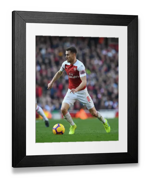 Framed Print : Arsenal's Aaron Ramsey in Action Against Southampton in the Premier League Framed Print : Arsenal's Aaron Ramsey in Action Against Southampton in the Premier League
