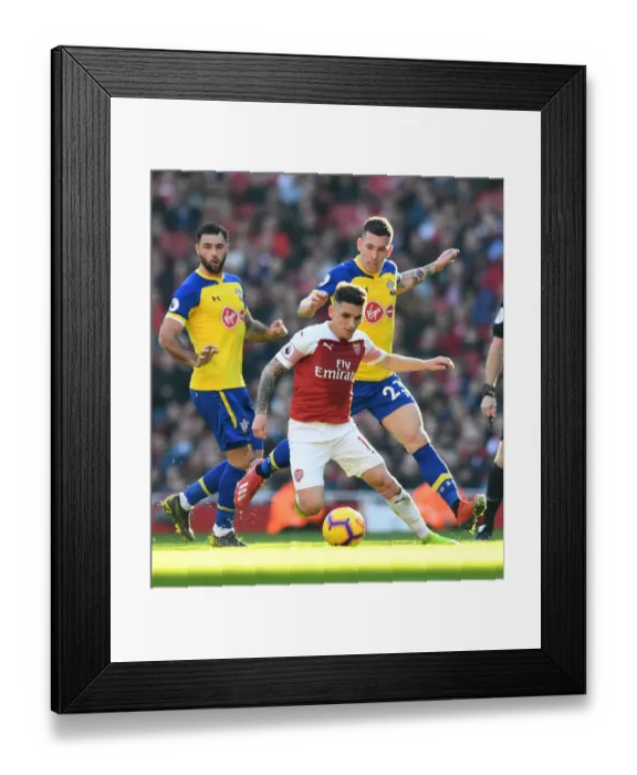 Framed Print : Clash of Midfielders: Torreira vs. Hojbjerg - Arsenal vs. Southampton, Premier League Framed Print : Clash of Midfielders: Torreira vs. Hojbjerg - Arsenal vs. Southampton, Premier League