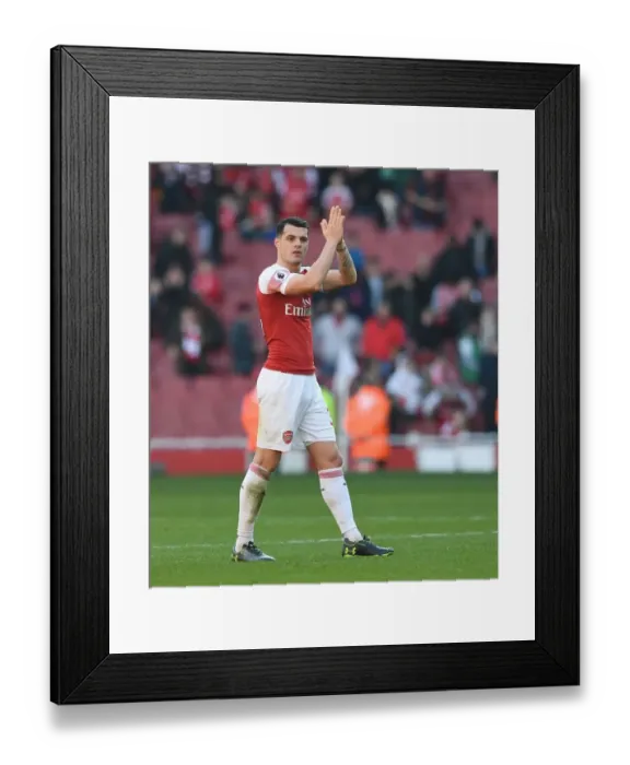 Framed Print : Granit Xhaka: Arsenal's Determined Midfielder Amidst Arsenal FC vs Southampton FC Clash (2019) Framed Print : Granit Xhaka: Arsenal's Determined Midfielder Amidst Arsenal FC vs Southampton FC Clash (2019)