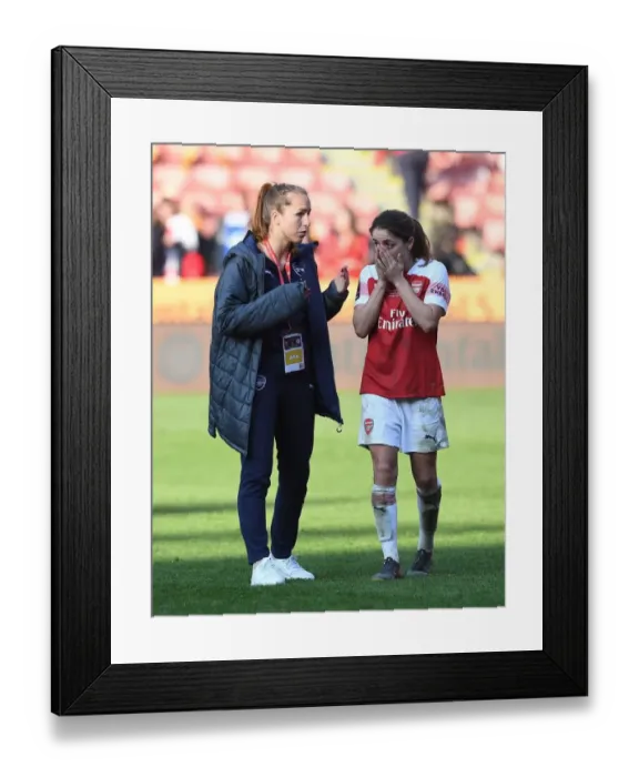 Framed Print : Arsenal Women's Team: Van de Donk and Walti Embrace After FA Womens Continental League Cup Final Victory
