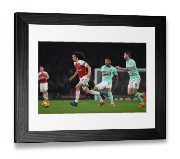 Framed Print : Guendouzi's Tense Triangle: A Clash with Gosling and King during Arsenal vs. Bournemouth