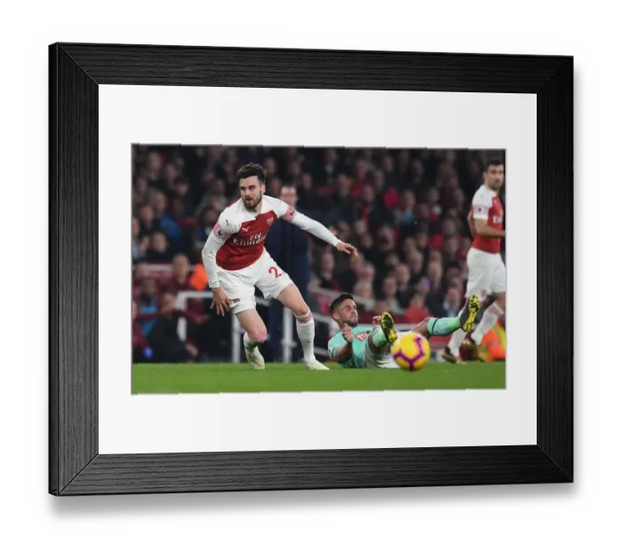 Framed Print : Arsenal's Carl Jenkinson Outmuscles Bournemouth's Andrew Surman in Premier League Clash Framed Print : Arsenal's Carl Jenkinson Outmuscles Bournemouth's Andrew Surman in Premier League Clash