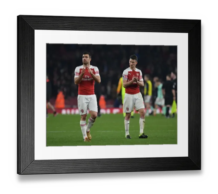 Framed Print : Arsenal's Sokratis and Koscielny Celebrate with Fans after Victory over Bournemouth Framed Print : Arsenal's Sokratis and Koscielny Celebrate with Fans after Victory over Bournemouth