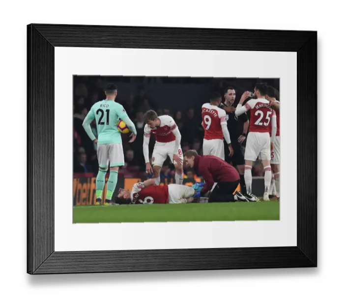 Framed Print : Laurent Koscielny (Arsenal) Jordan Reece (Arsenal Physio) Framed Print : Laurent Koscielny (Arsenal) Jordan Reece (Arsenal Physio)