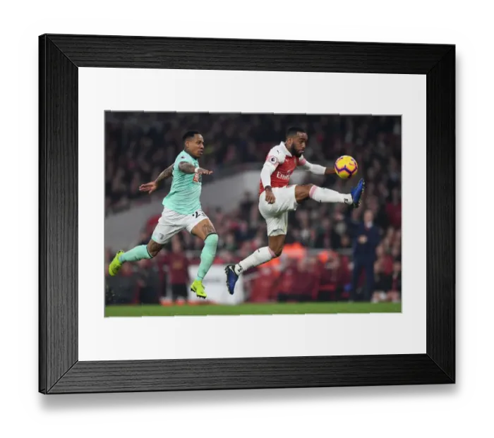 Framed Print : Arsenal's Lacazette Faces Off Against Clyne in Intense Arsenal v Bournemouth Clash Framed Print : Arsenal's Lacazette Faces Off Against Clyne in Intense Arsenal v Bournemouth Clash