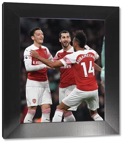 Arsenal's Mkhitaryan, Ozil, and Aubameyang: A Triumphant Goal Celebration Against Bournemouth