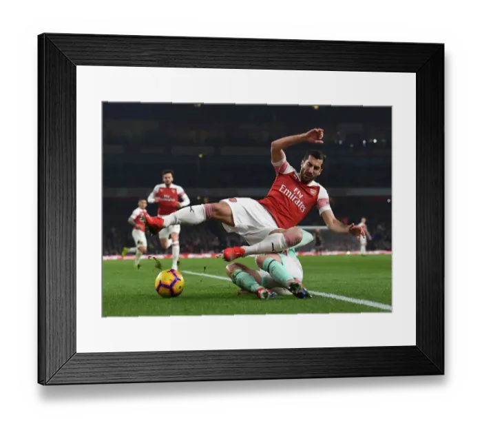 Framed Print : Arsenal's Mkhitaryan Clashes with Bournemouth's Smith in Premier League Showdown