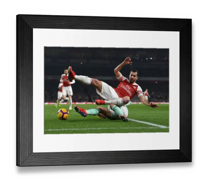 Framed Print : Intense Battle: Mkhitaryan vs. Smith in Arsenal's Premier League Clash against Bournemouth Framed Print : Intense Battle: Mkhitaryan vs. Smith in Arsenal's Premier League Clash against Bournemouth