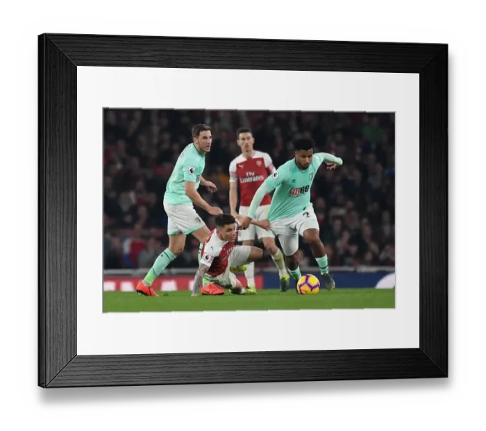 Framed Print : Torreira vs. Mousset: Intense Battle in Arsenal's Victory over Bournemouth Framed Print : Torreira vs. Mousset: Intense Battle in Arsenal's Victory over Bournemouth