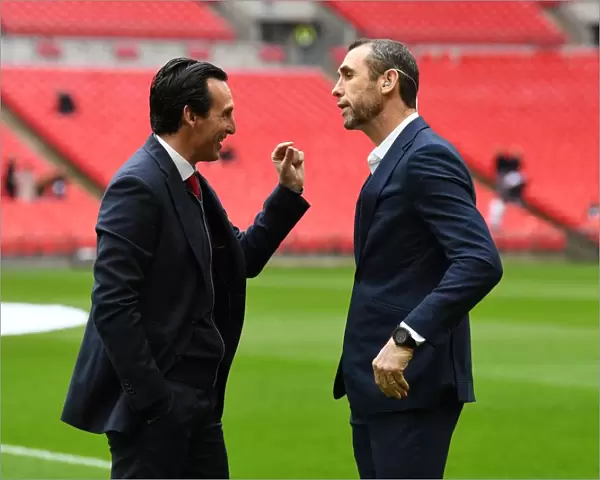 Unai Emery and Martin Keown: A Pre-Match Chat Before the Tottenham-Arsenal Rivalry in the Premier League