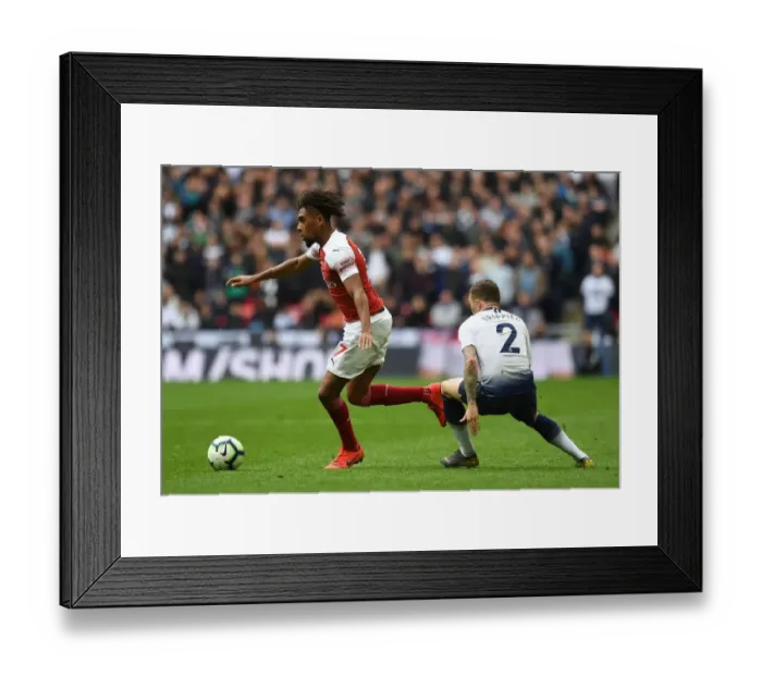 Framed Print : Clash of Wings: Iwobi vs. Trippier in the North London Derby
