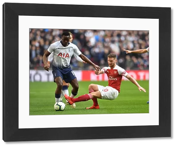 Mustafi vs. Wanyama: Intense Battle in Tottenham Hotspur vs. Arsenal FC Premier League Clash