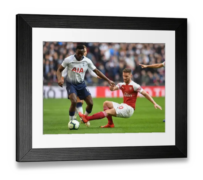 Framed Print : Mustafi vs. Wanyama: Intense Battle in Tottenham Hotspur vs. Arsenal FC Premier League Clash Framed Print : Mustafi vs. Wanyama: Intense Battle in Tottenham Hotspur vs. Arsenal FC Premier League Clash