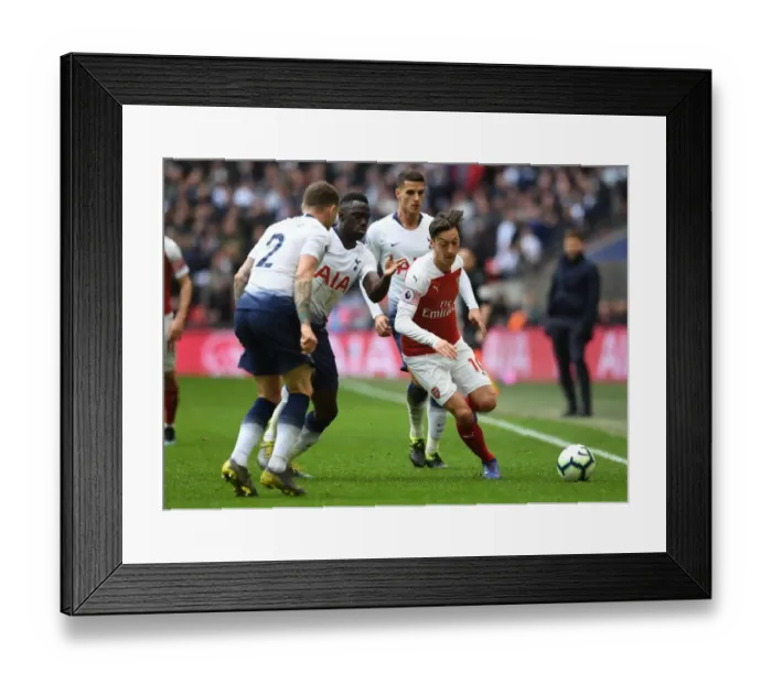 Framed Print : Mesut Ozil Clashes with Triple Threat: Tripper, Sanchez, and Lamela in Intense Tottenham-Arsenal Rivalry Framed Print : Mesut Ozil Clashes with Triple Threat: Tripper, Sanchez, and Lamela in Intense Tottenham-Arsenal Rivalry