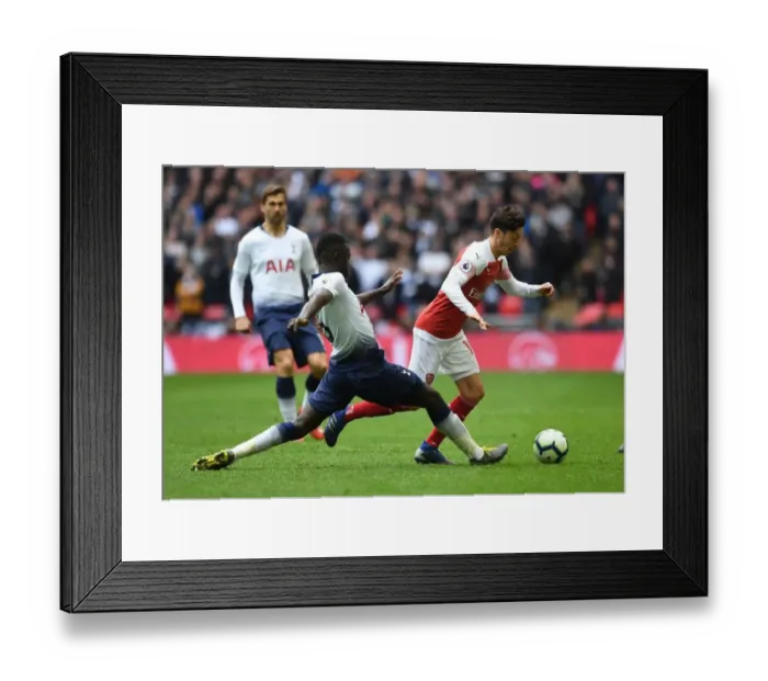 Framed Print : Mesut Ozil vs. Davison Sanchez: Battle at Wembley - Premier League Showdown Framed Print : Mesut Ozil vs. Davison Sanchez: Battle at Wembley - Premier League Showdown