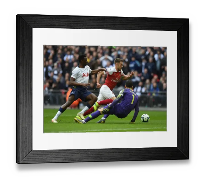 Framed Print : Ramsey Stuns Spurs: Dramatic Goal Against Wanyama and Lloris in Arsenal's Victory