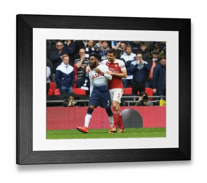 Framed Print : Sokratis and Danny Rose Embrace Amidst Premier League Rivalry: Tottenham vs. Arsenal Framed Print : Sokratis and Danny Rose Embrace Amidst Premier League Rivalry: Tottenham vs. Arsenal