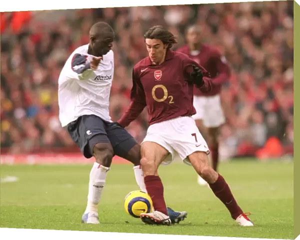 Robert Pires (Arsenal) Abdoulaye Faye (Bolton). Arsenal 0: 1 Bolton Wanderers