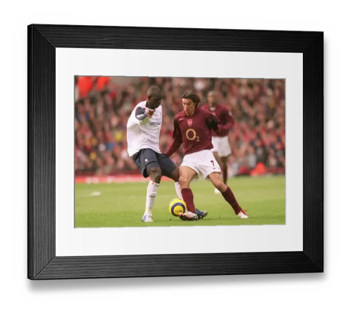 Framed Print : Robert Pires (Arsenal) Abdoulaye Faye (Bolton). Arsenal 0: 1 Bolton Wanderers Framed Print : Robert Pires (Arsenal) Abdoulaye Faye (Bolton). Arsenal 0: 1 Bolton Wanderers