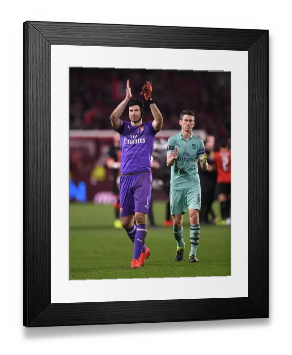 Framed Print : Arsenal's Petr Cech and Laurent Koscielny Celebrate with Fans after First Leg of Europa League Match against Stade Rennais