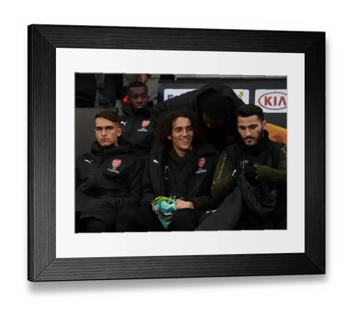 Framed Print : Arsenal Bench Players Before Stade Rennais UEFA Europa League Clash Framed Print : Arsenal Bench Players Before Stade Rennais UEFA Europa League Clash