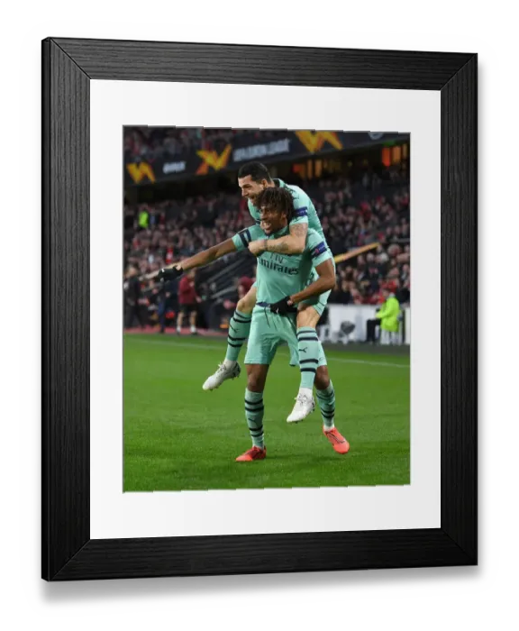 Framed Print : Arsenal's Europa League Victory: Iwobi and Xhaka's Memorable Goal Celebration Framed Print : Arsenal's Europa League Victory: Iwobi and Xhaka's Memorable Goal Celebration
