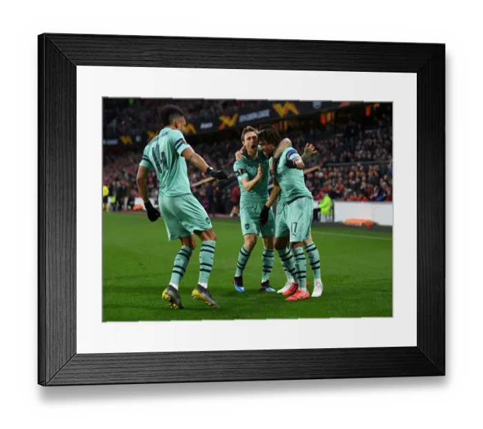Framed Print : Arsenal's Alex Iwobi, Monreal, and Aubameyang Celebrate Goal vs Stade Rennais in Europa League Framed Print : Arsenal's Alex Iwobi, Monreal, and Aubameyang Celebrate Goal vs Stade Rennais in Europa League