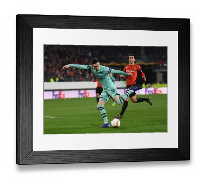 Framed Print : Mesut Ozil's Standout Performance: Arsenal's UEFA Europa League Victory over Stade Rennais (2018-19) Framed Print : Mesut Ozil's Standout Performance: Arsenal's UEFA Europa League Victory over Stade Rennais (2018-19)