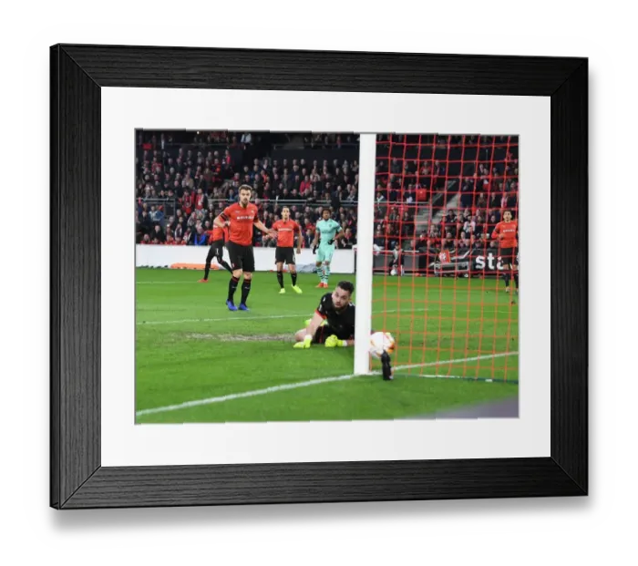 Framed Print : Arsenal's Alex Iwobi Scores Dramatic Goal in UEFA Europa League Clash Against Stade Rennais Framed Print : Arsenal's Alex Iwobi Scores Dramatic Goal in UEFA Europa League Clash Against Stade Rennais