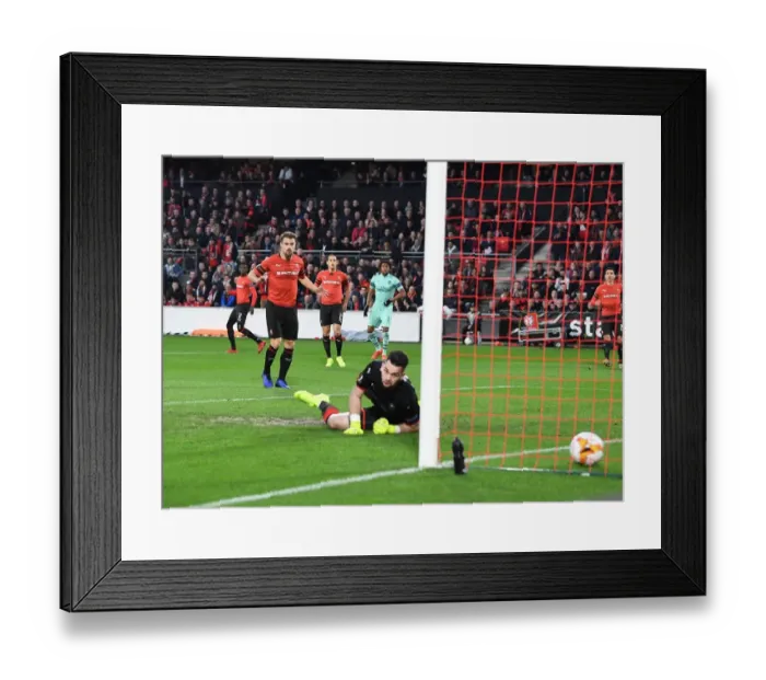 Framed Print : Iwobi Scores the Winner: Arsenal's Europa League Victory Over Rennes