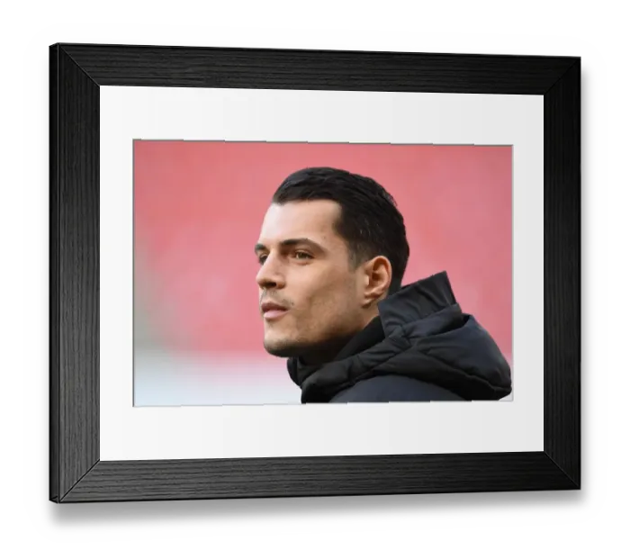 Framed Print : Granit Xhaka's Unwavering Focus: Arsenal's Europa League Showdown at Stade Rennais