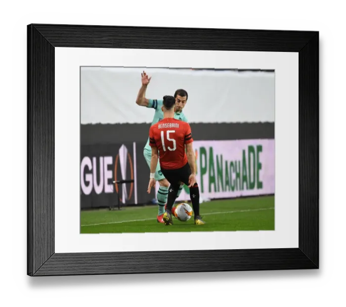 Framed Print : Mkhitaryan's Slick Nutmeg: Arsenal's Advantage Over Rennes in Europa League Showdown Framed Print : Mkhitaryan's Slick Nutmeg: Arsenal's Advantage Over Rennes in Europa League Showdown