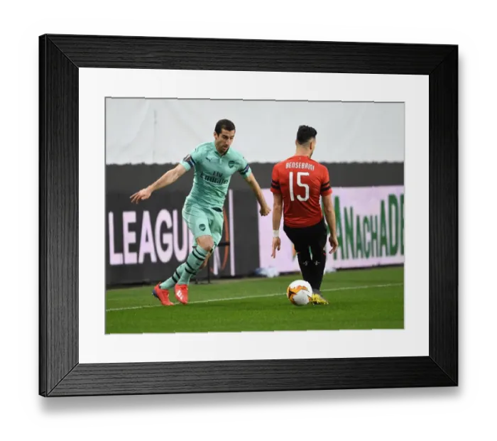 Framed Print : Mkhitaryan's Nutmeg: Arsenal's Edge in Europa League Clash Against Rennes (Stade Rennais vs Arsenal, March 2019)
