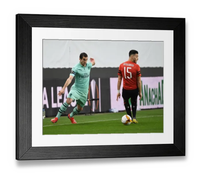 Framed Print : Mkhitaryan's Nutmeg: Arsenal's Edge in Europa League Clash against Rennes