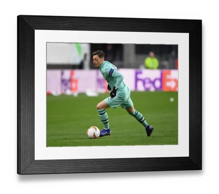 Framed Print : Mesut Ozil in Action: Arsenal's Europa League Clash at Stade Rennais (2018-19) Framed Print : Mesut Ozil in Action: Arsenal's Europa League Clash at Stade Rennais (2018-19)