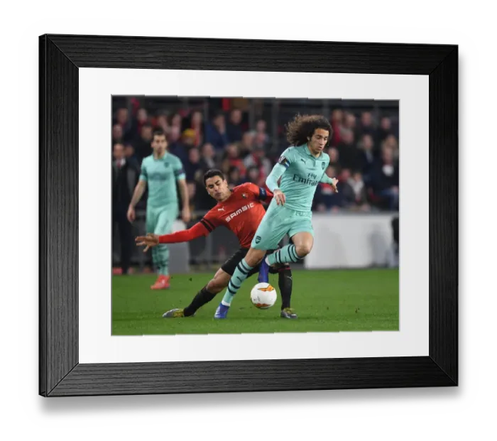 Framed Print : Guendouzi vs. Andre: A Fiery Europa League Clash between Arsenal and Rennes