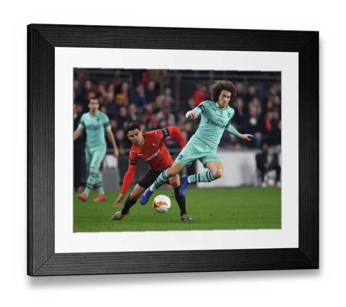 Framed Print : Guendouzi vs. Andre: Intense Clash in Arsenal's Europa League Battle with Rennes Framed Print : Guendouzi vs. Andre: Intense Clash in Arsenal's Europa League Battle with Rennes