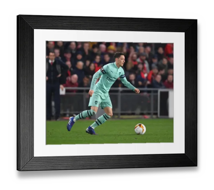 Framed Print : Mesut Ozil in Action: Arsenal vs. Stade Rennais, UEFA Europa League (2018-19) Framed Print : Mesut Ozil in Action: Arsenal vs. Stade Rennais, UEFA Europa League (2018-19)