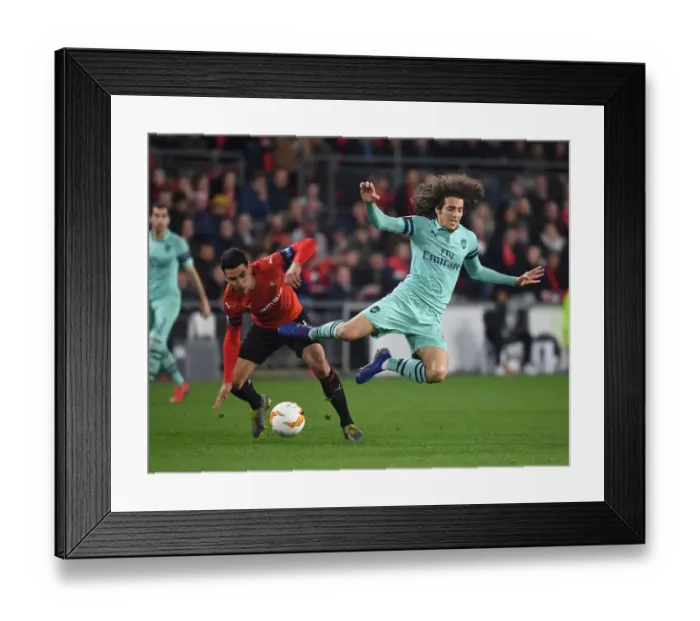 Framed Print : Guendouzi vs. Andre: A Midfield Battle in Arsenal's Europa League Clash with Rennes
