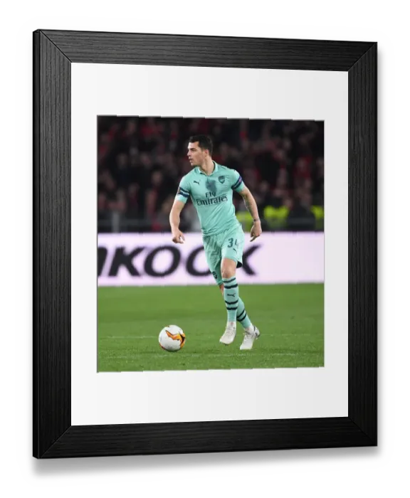 Framed Print : Granit Xhaka: Arsenal's Midfield Maestro Dazzles in UEFA Europa League Showdown Against Stade Rennais Framed Print : Granit Xhaka: Arsenal's Midfield Maestro Dazzles in UEFA Europa League Showdown Against Stade Rennais