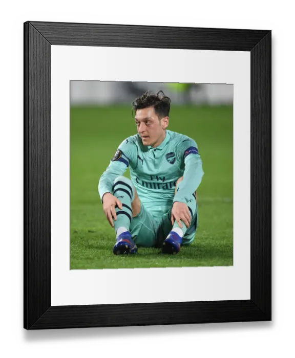 Framed Print : Mesut Ozil in Action: Arsenal vs Stade Rennais, UEFA Europa League Round of 16 First Leg (2018-19)