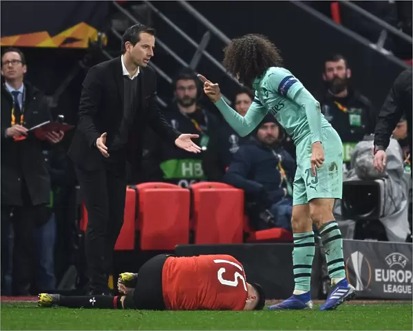Arsenal's Guendouzi and Rennes Manager Clash in Europa League First Leg